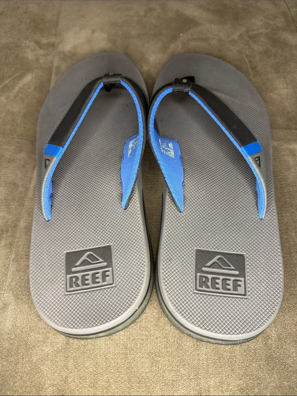 Reef Fanning Men's Gray and Blue Flip-Flop Sandals with bottle opener on sole